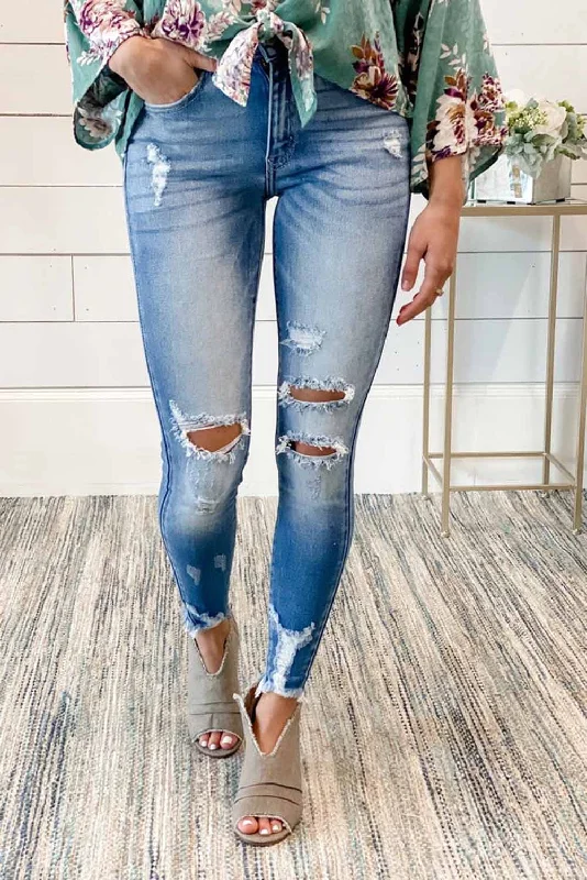 Faded Mid High Rise Jeans with Holes